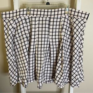 Torrid pink & black plaid twill skater skirt. Size 4.